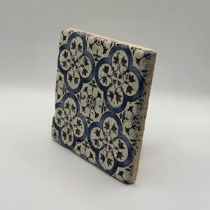 Ethnics pattern number 31 printed on a natural travertine stone coaster