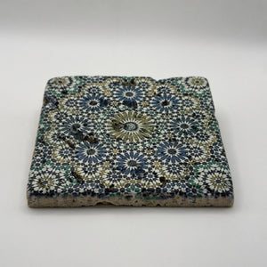 Ethnics pattern number 33 printed on a natural travertine stone coaster
