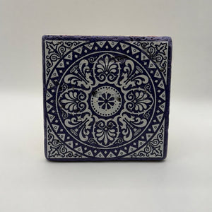 Ethnics pattern number 34 printed on a natural travertine stone coaster