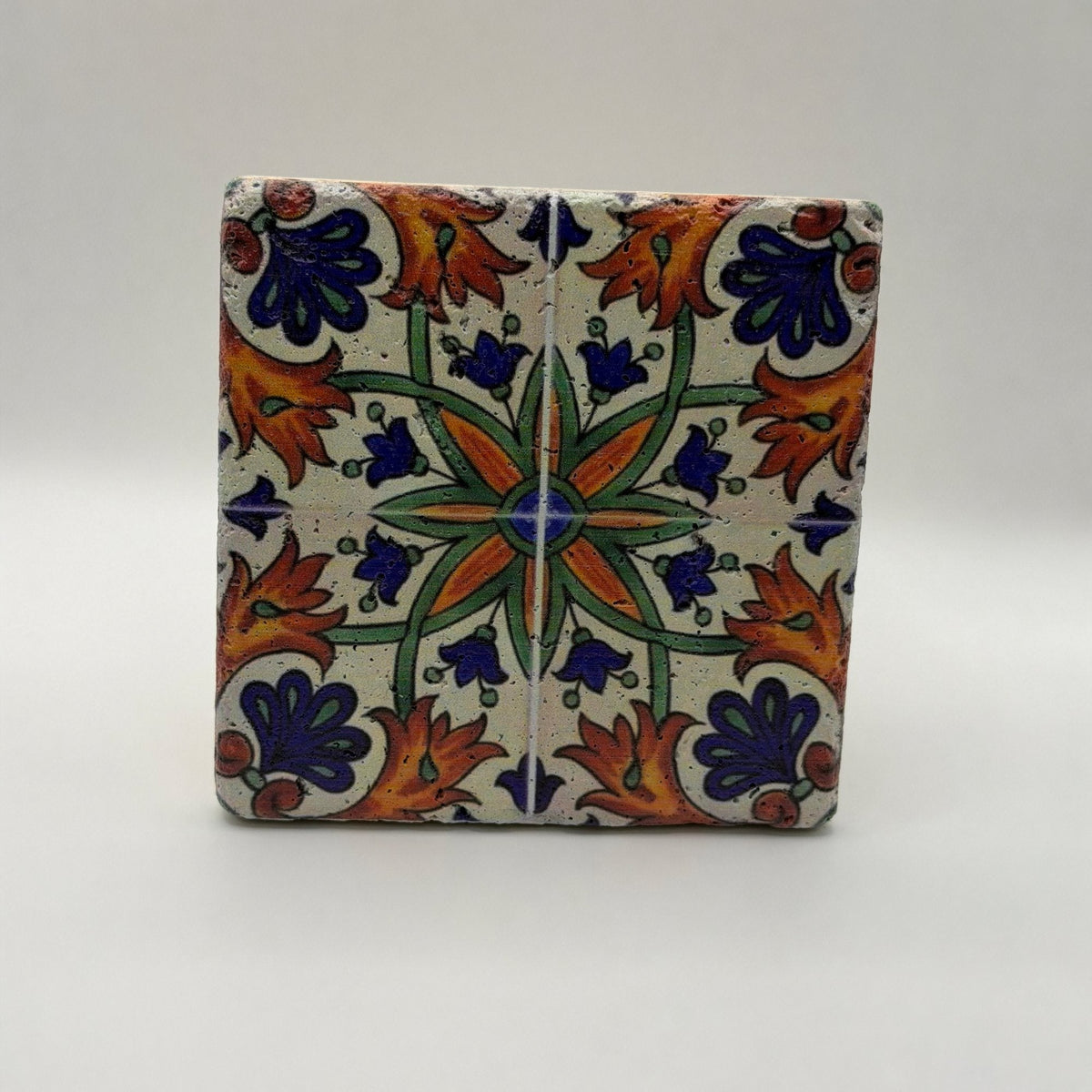 Ethnics pattern number 37 printed on a natural travertine stone coaster