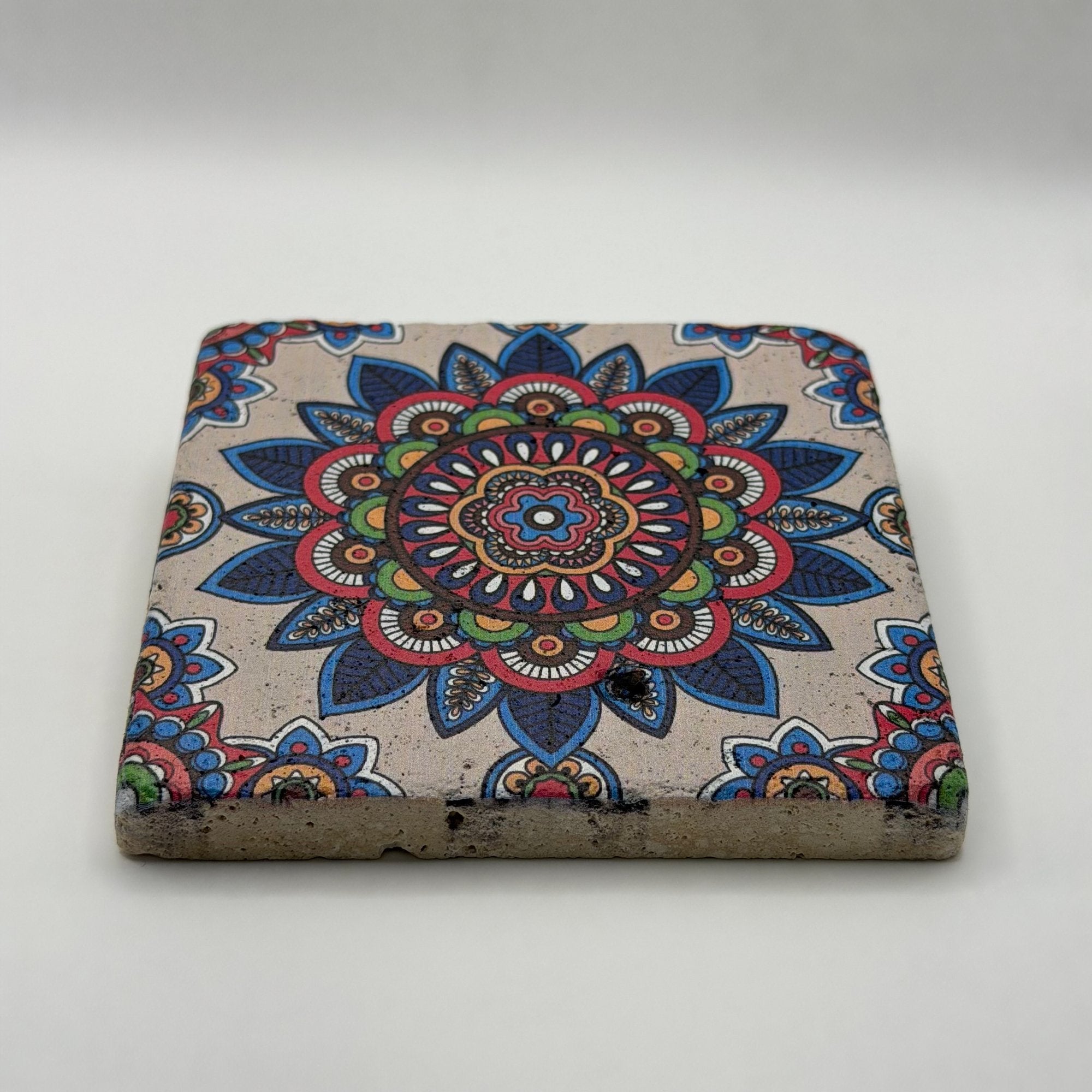 Ethnics pattern number 38 printed on a natural travertine stone coaster