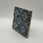 Ethnics pattern number 40 printed on a natural travertine stone coaster