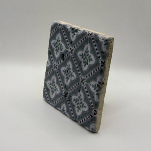 Ethnics pattern number 40 printed on a natural travertine stone coaster