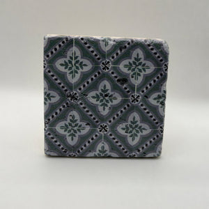 Ethnics pattern number 40 printed on a natural travertine stone coaster