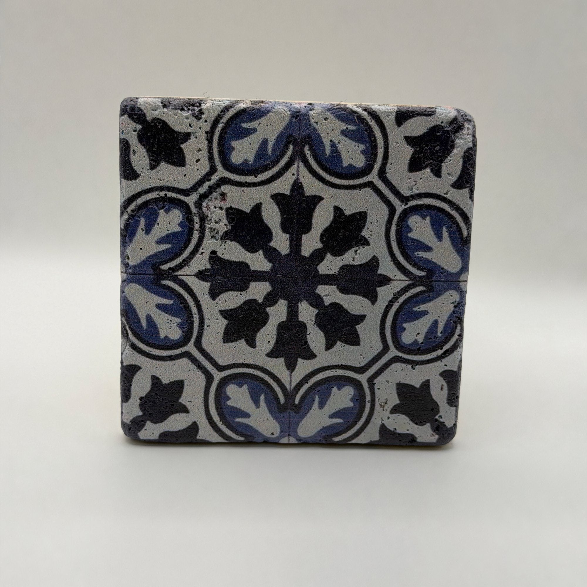 Ethnics pattern number 42 printed on a natural travertine stone coaster