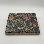 Ethnics pattern number 44 printed on a natural travertine stone coaster