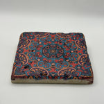 Ethnics pattern number 45 printed on a natural travertine stone coaster