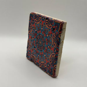 Ethnics pattern number 45 printed on a natural travertine stone coaster