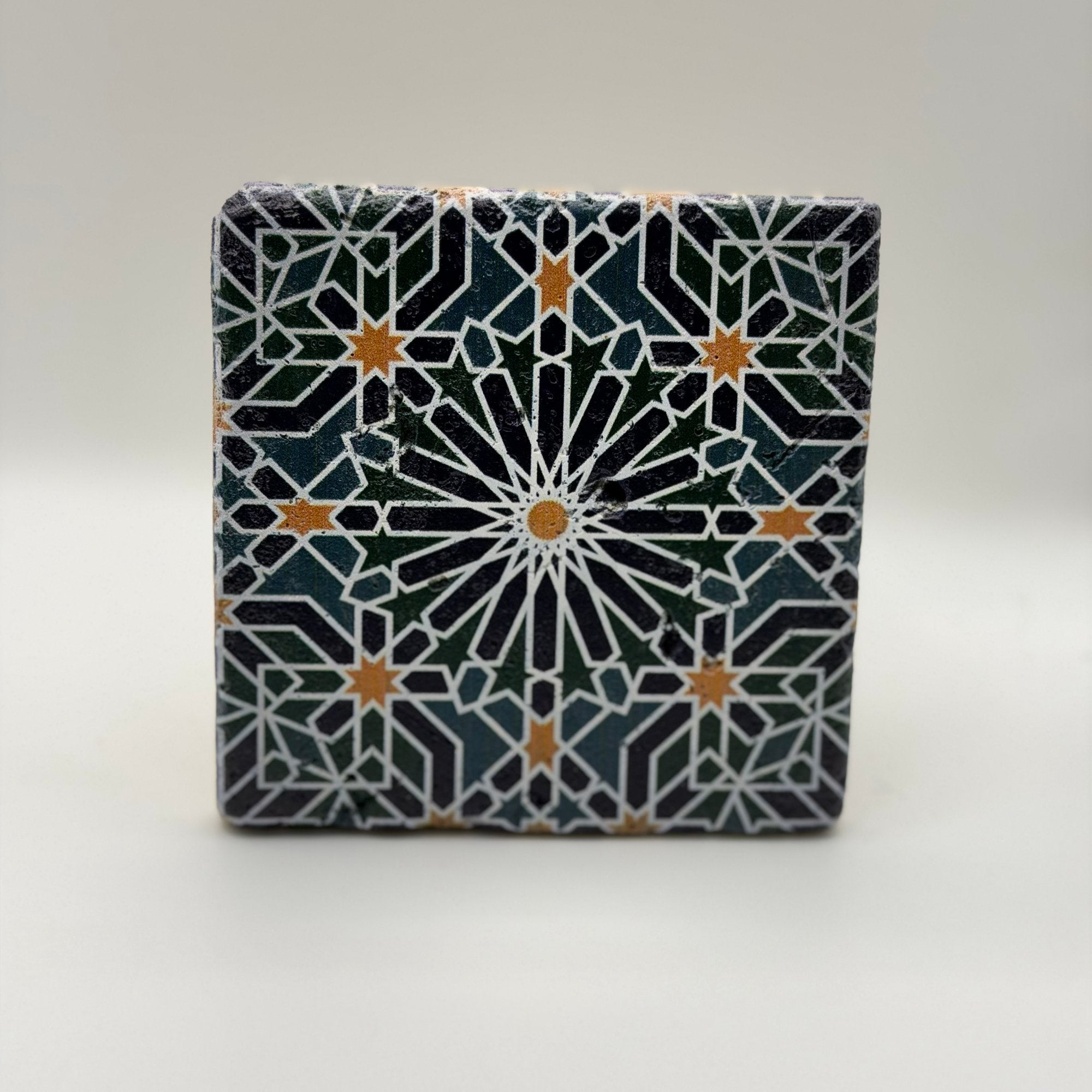 Ethnics pattern number 46 printed on a natural travertine stone coaster