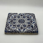 Ethnics pattern number 48 printed on a natural travertine stone coaster