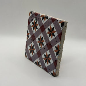 Ethnics pattern number 49 printed on a natural travertine stone coaster