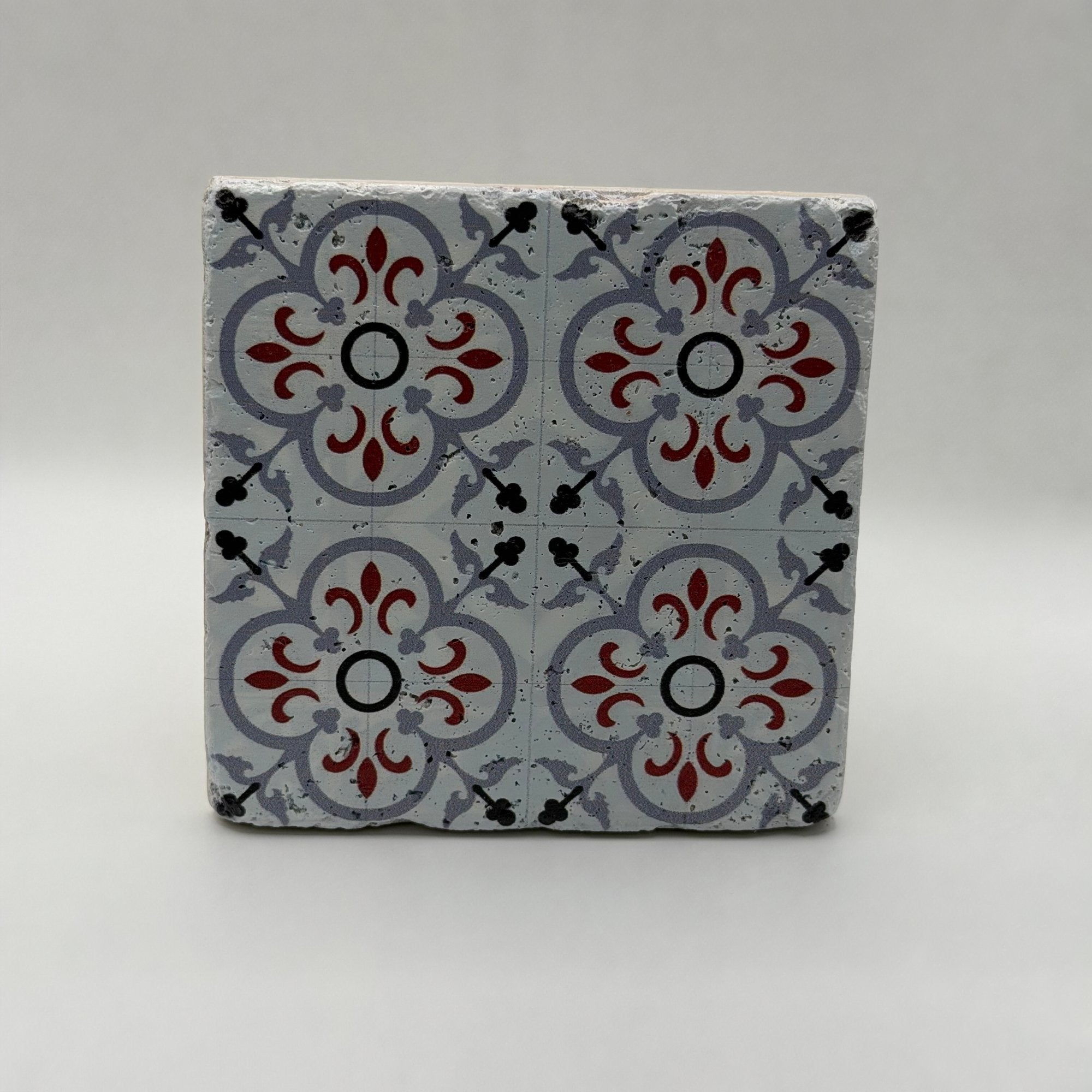 Ethnics pattern number 50 printed on a natural travertine stone coaster