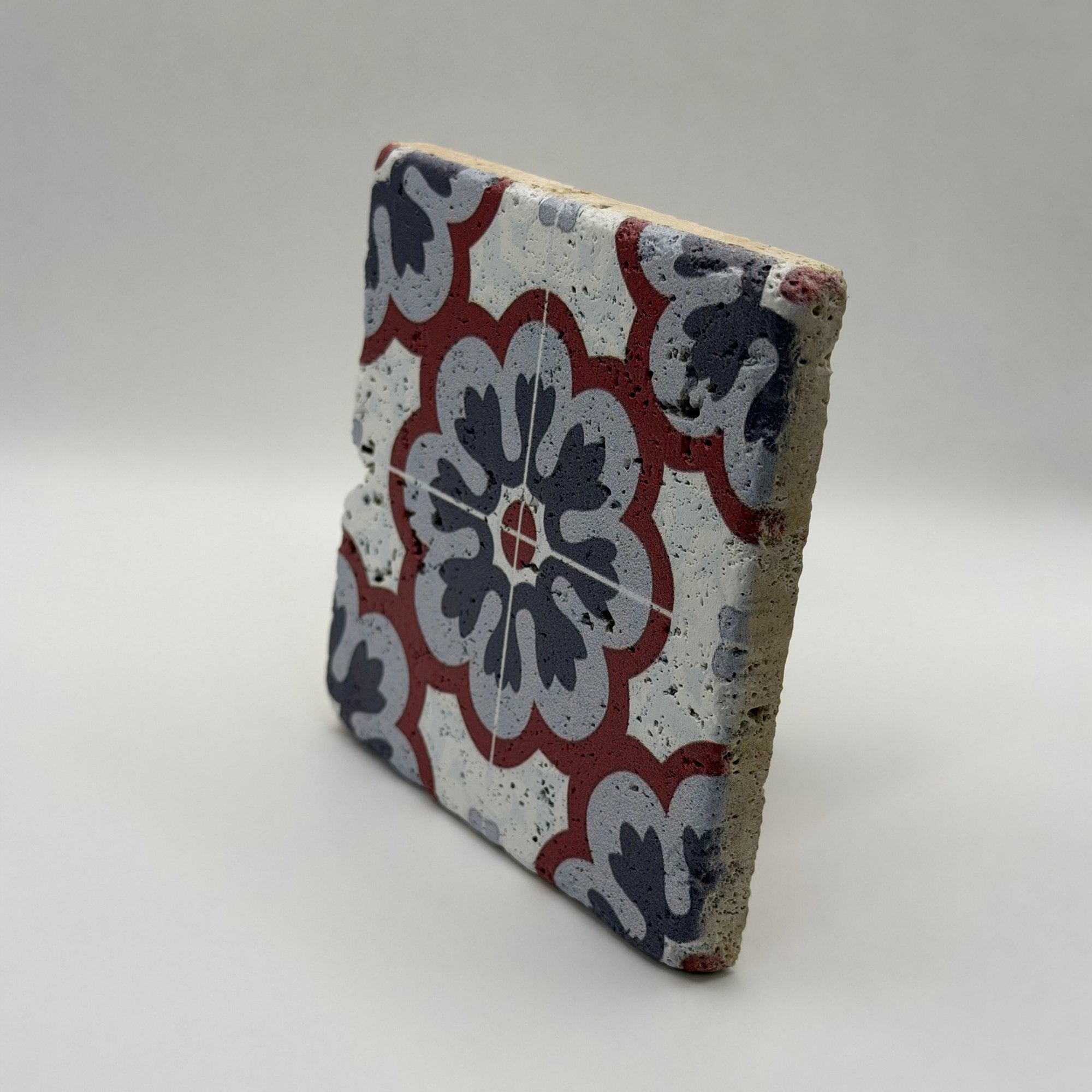 Ethnics pattern number 55 printed on a natural travertine stone coaster