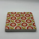 Ethnics pattern number 56 printed on a natural travertine stone coaster