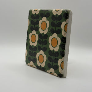 Ethnics pattern number 57 printed on a natural travertine stone coaster