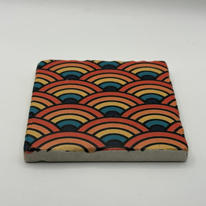Ethnics pattern number 59 printed on a natural travertine stone coaster