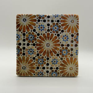 Ethnics pattern number 61 printed on a natural travertine stone coaster