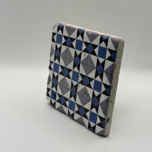 Ethnic pattern number 23 printed on a natural stone coaster