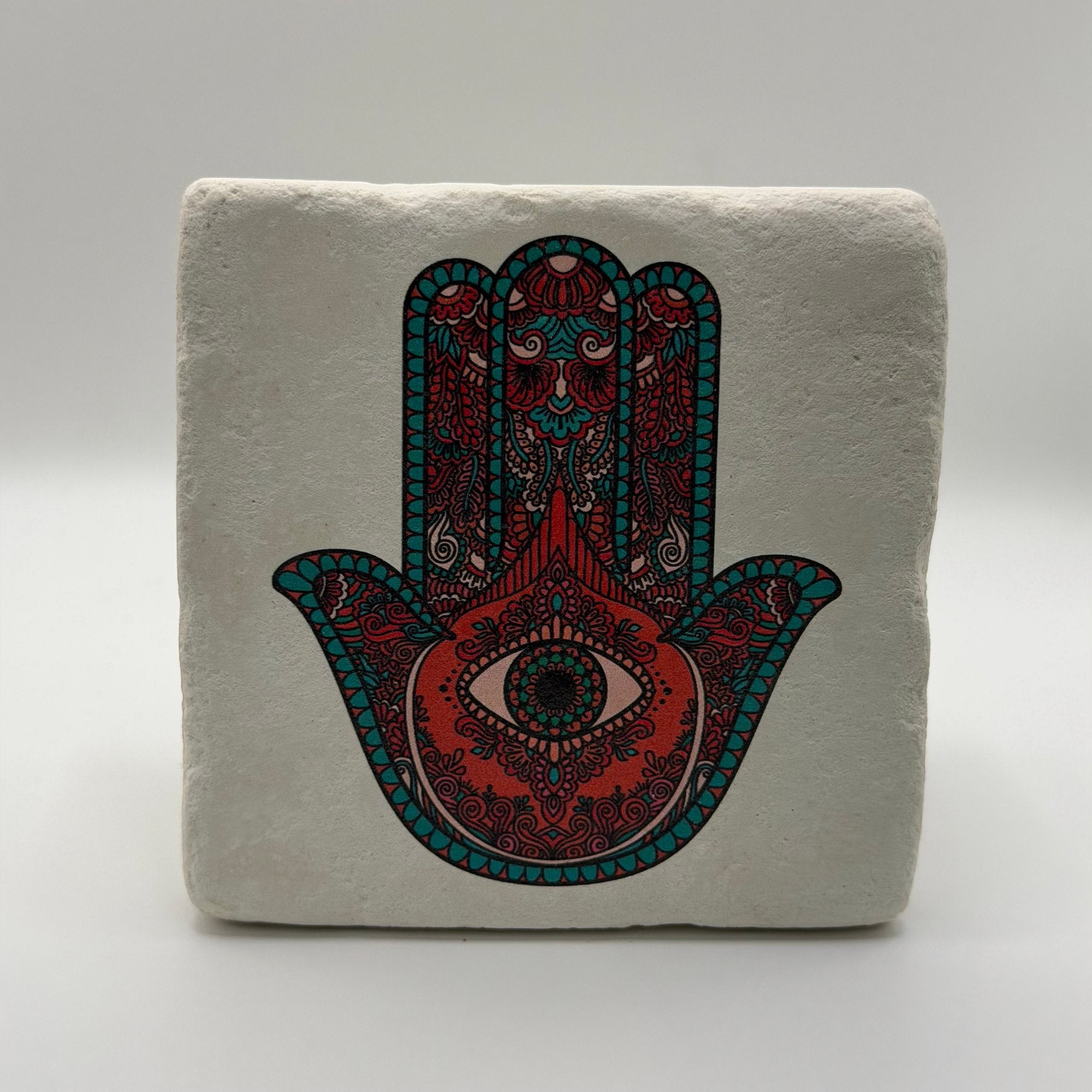 Green Fatima's Hand artwork printed on square travertine stone coaster