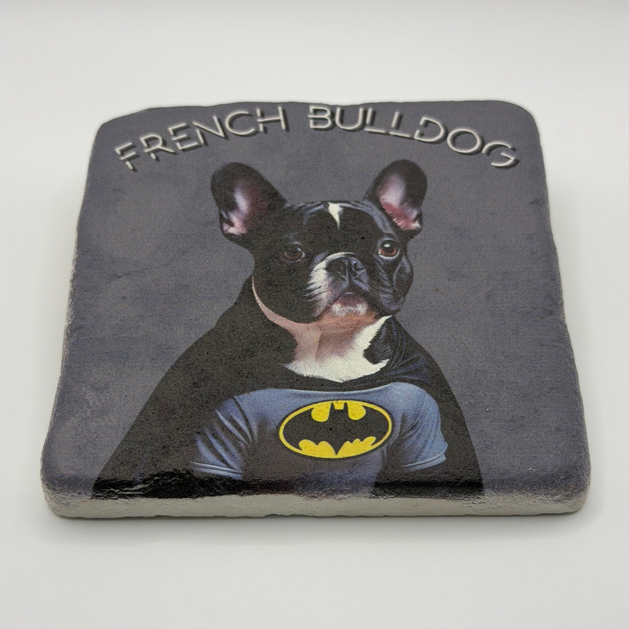 French Bulldog Batman Cosplay artwork printed on premium natural travertine stone coaster