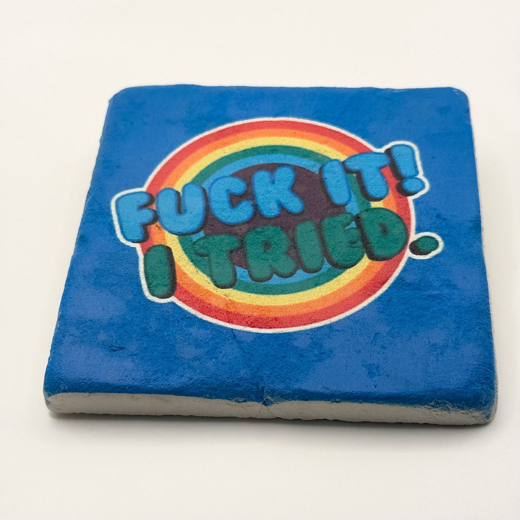 'Fuck It Tried' quote printed on square travertine stone coaster