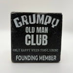 Grumpy Old Man logo printed on square travertine stone coaster