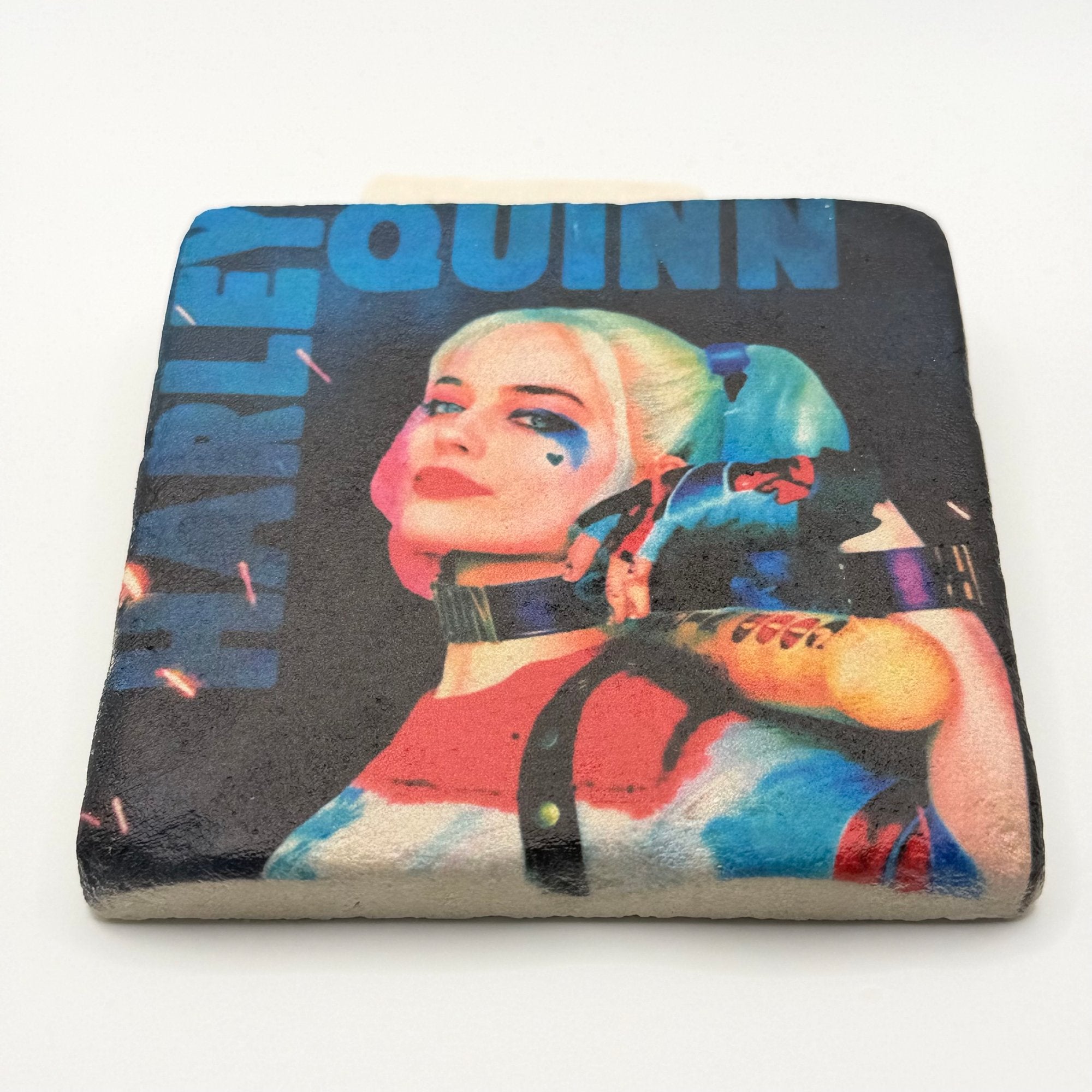 Harley Quinn artwork printed on square travertine stone coaster
