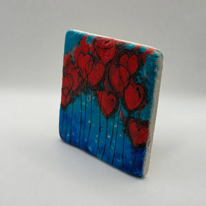 Hearts on fire design printed on square natural travertine stone coaster