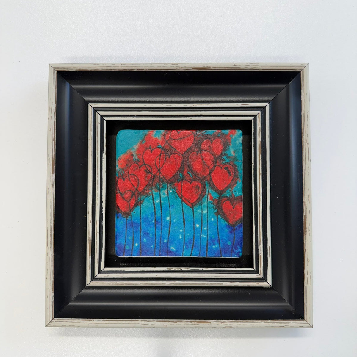 Variant Mapping v4 | hearts-on-fire-natural-travertine-stone-coaster | with Black Frame | sha256:904513bc79b4