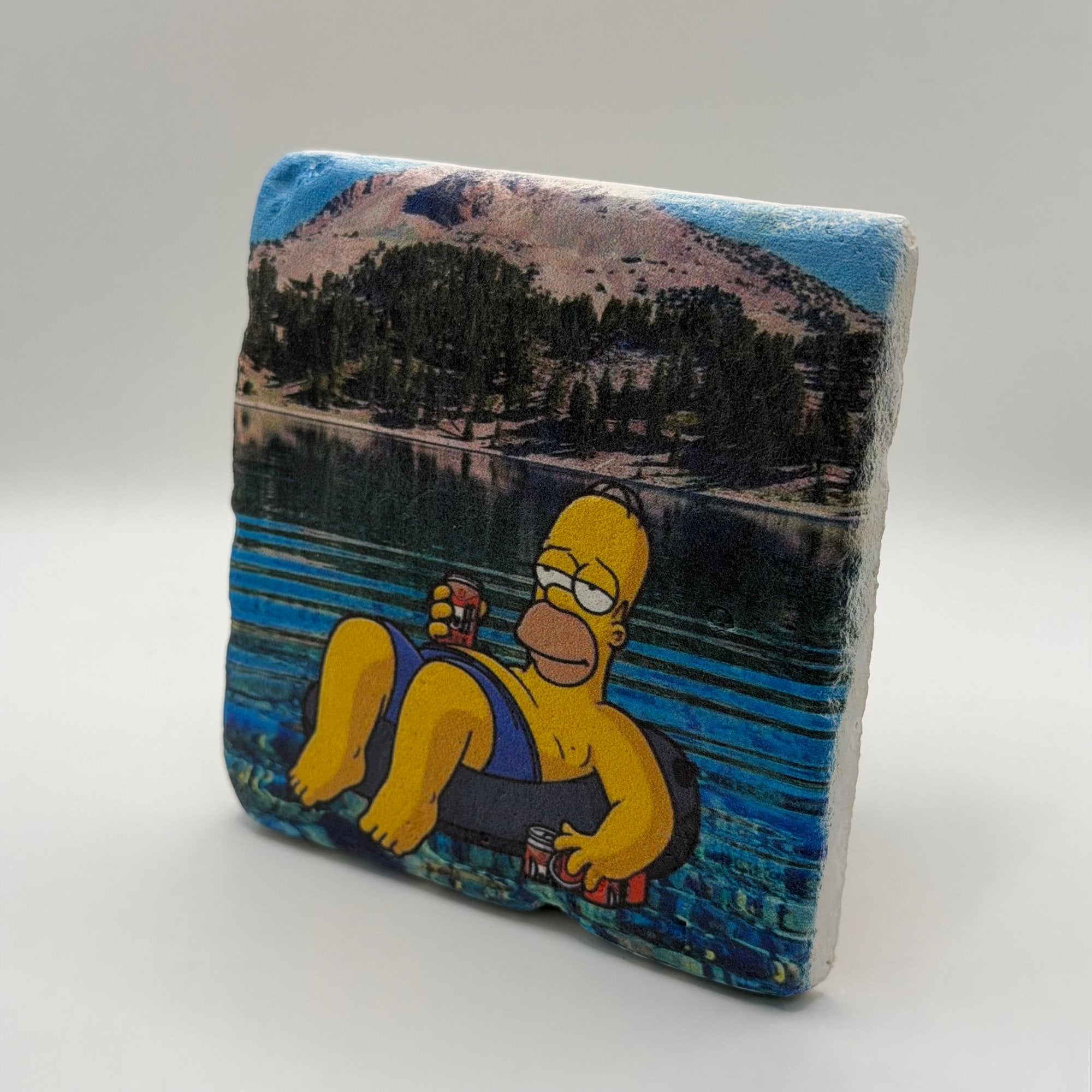Homer Simpson cartoon character printed on square travertine stone coaster