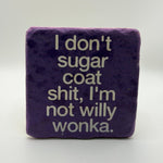Funny quote 'I don't sugar coat, I'm not Willy Wonka' printed on square natural travertine stone coaster