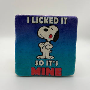 Funny slogan 'I Licked It So It's Mine' printed on square natural travertine stone coaster