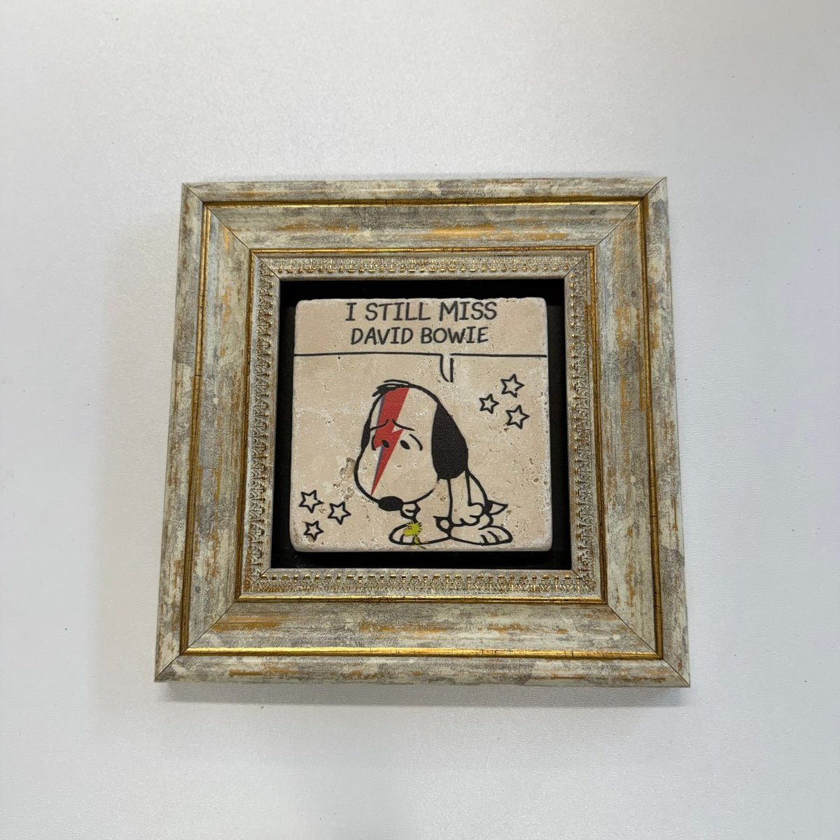 Variant Mapping v4 | i-still-miss-david-bowie-natural-travertine-coaster | with Gold Frame | sha256:9b8f8cfdd568