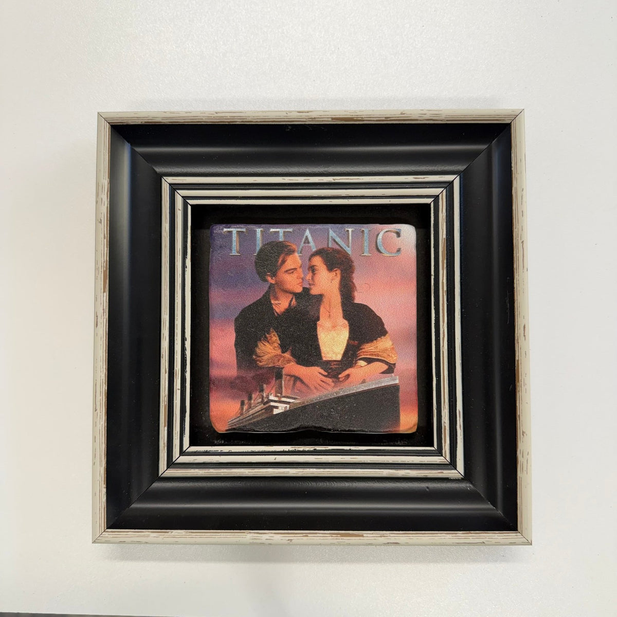 Variant Mapping v4 | james-cameron-titanic-natural-stone-coaster | with Black Frame | sha256:db1d0006af42
