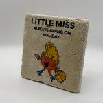 Little Miss Always Going On Holiday artwork printed on square travertine stone coaster