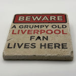 Grumpy old Liverpool fan design printed on square travertine stone coaster
