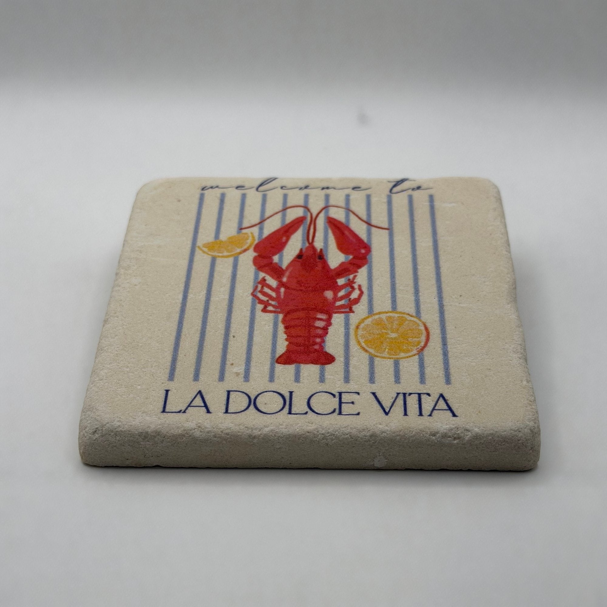 Illustrated lobster printed on square natural travertine stone coaster
