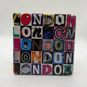 Vintage London alphabet design printed on square travertine stone coaster