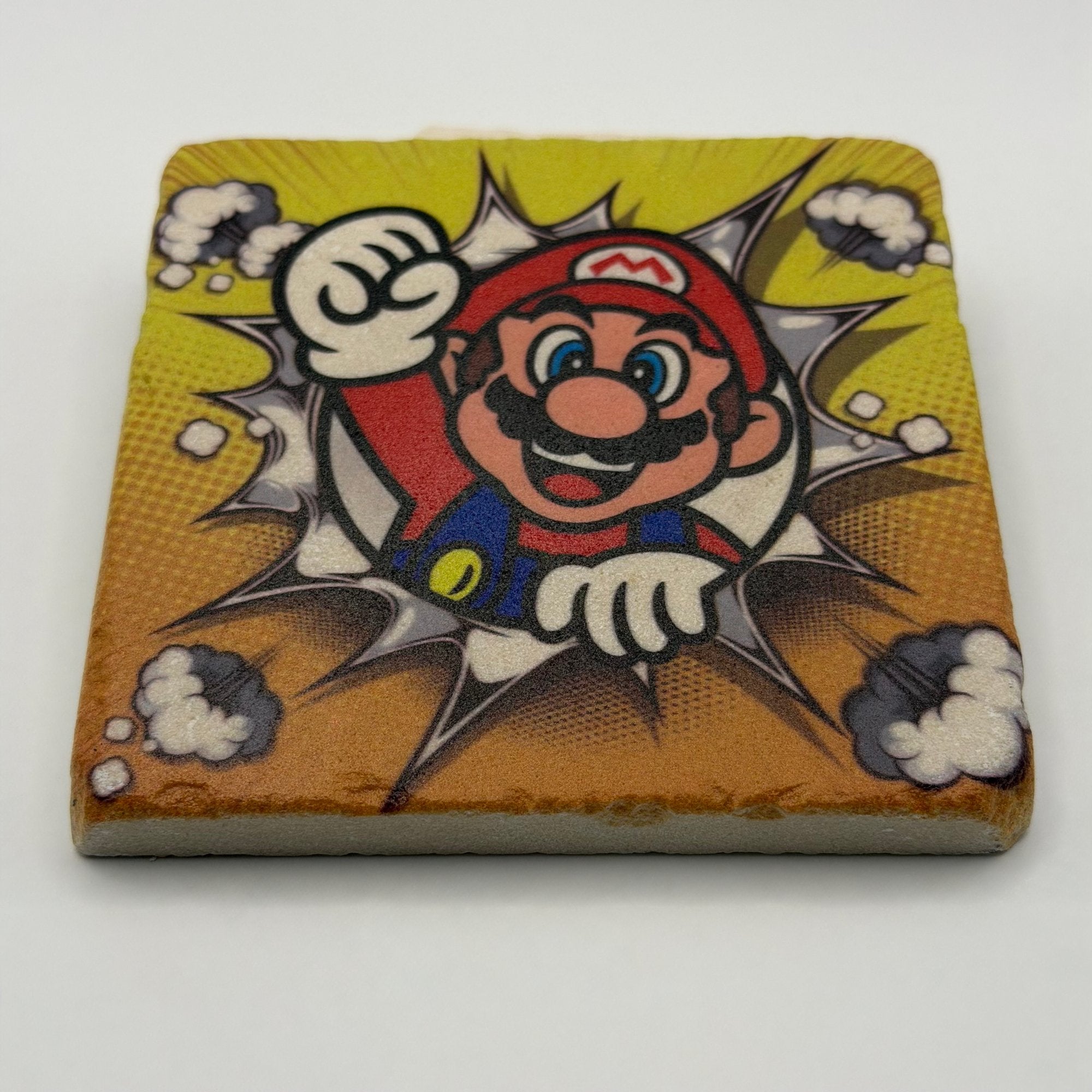 Super Mario Bros. artwork printed on square travertine stone coaster