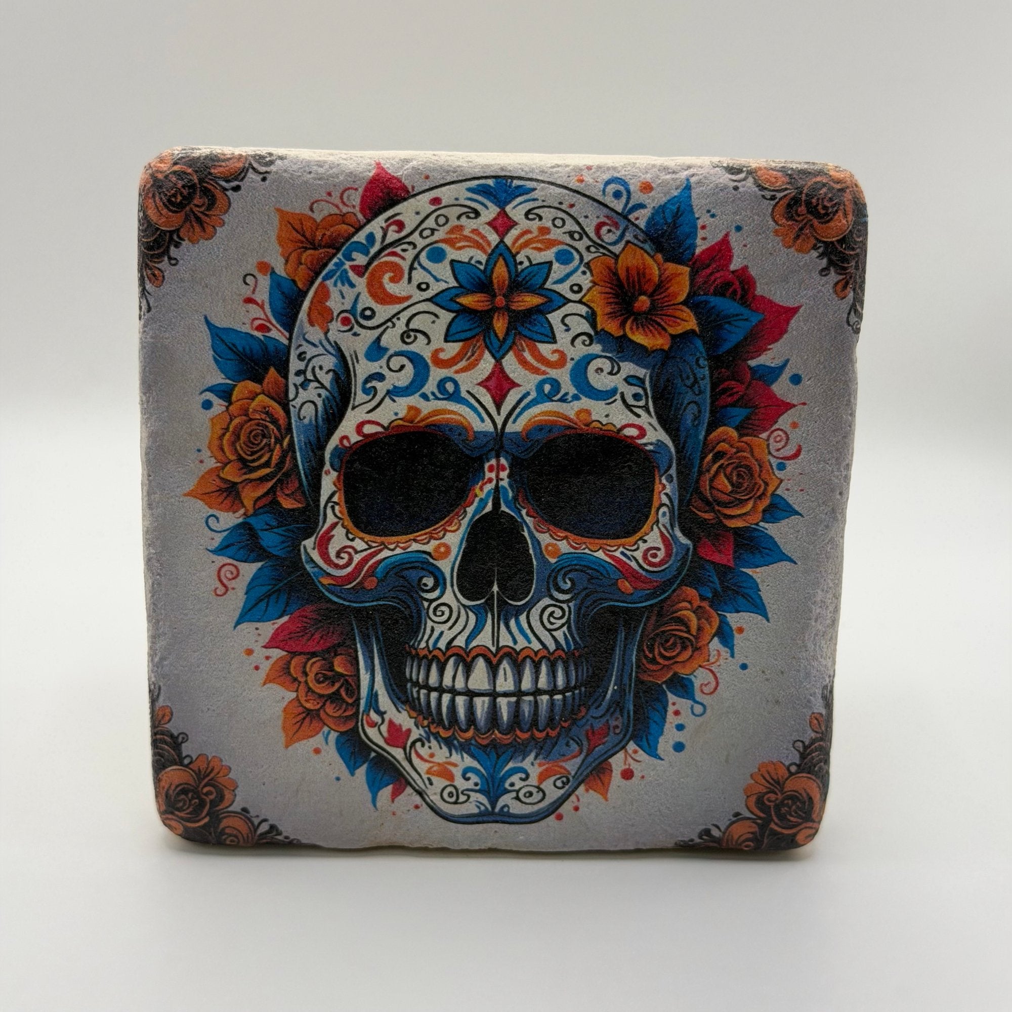 Mexican sugar skull artwork printed on square travertine stone coaster