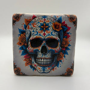 Mexican sugar skull artwork printed on square travertine stone coaster