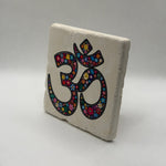 Om Aum Namaste mantra printed on square natural travertine stone coaster