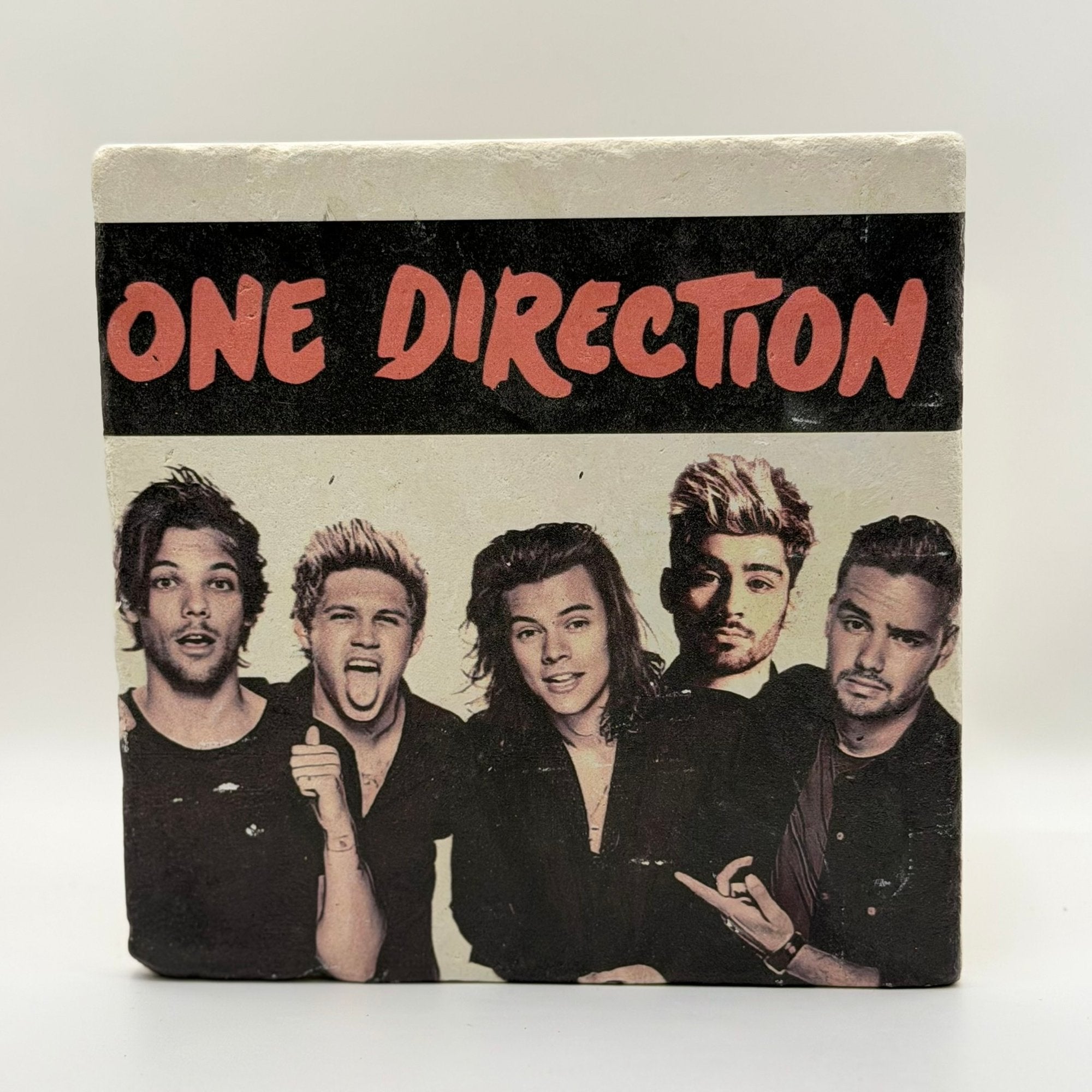 One Direction Natural Travertine Stone Hotpad artwork