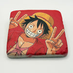 One Piece Luffy artwork printed on square travertine stone coaster