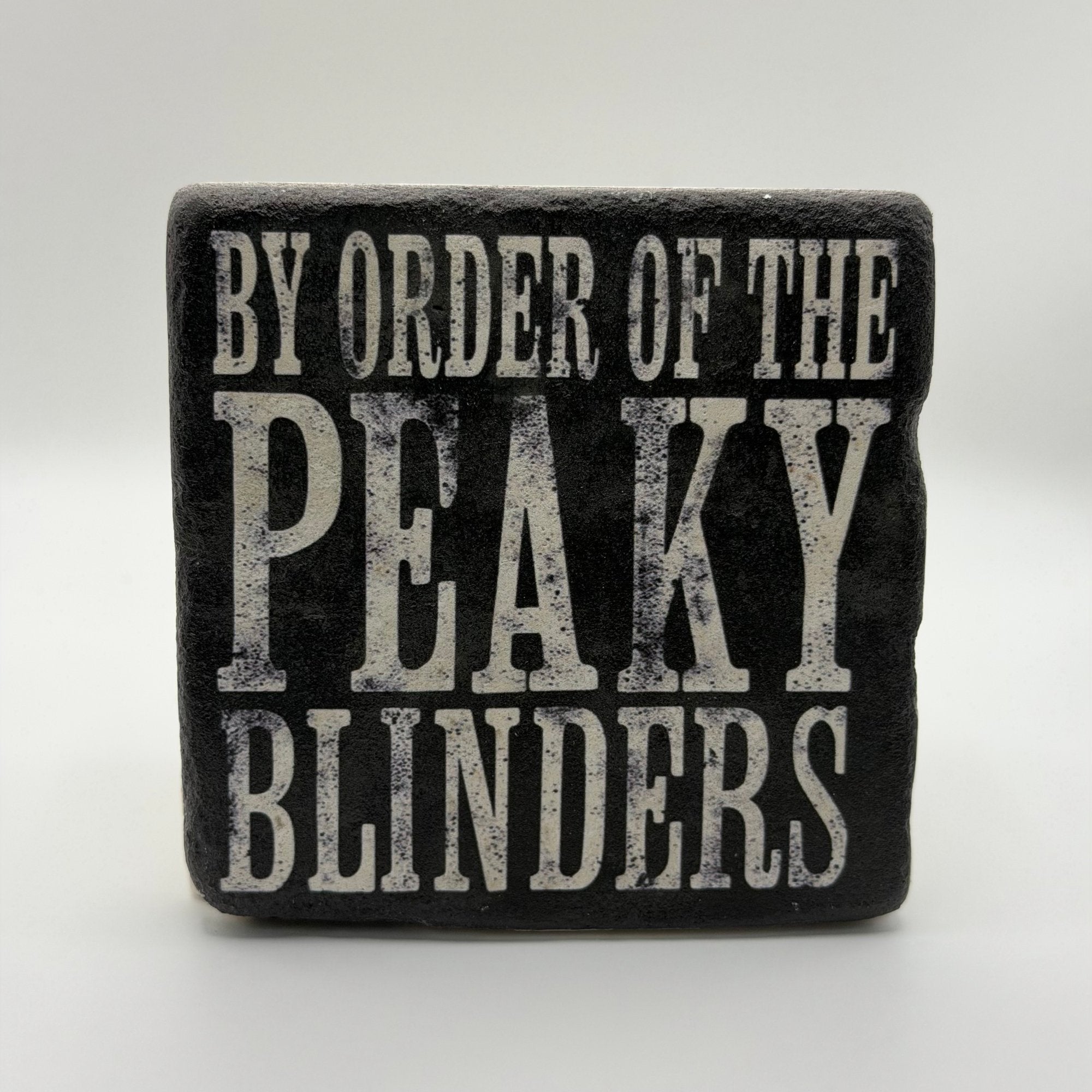 Peaky Blinders logo or character printed on square travertine stone coaster