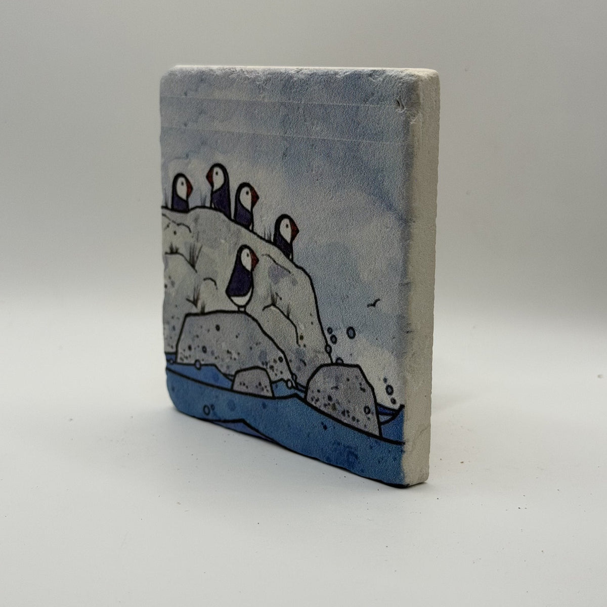 Penguins Natural Travertine Stone Coaster artwork