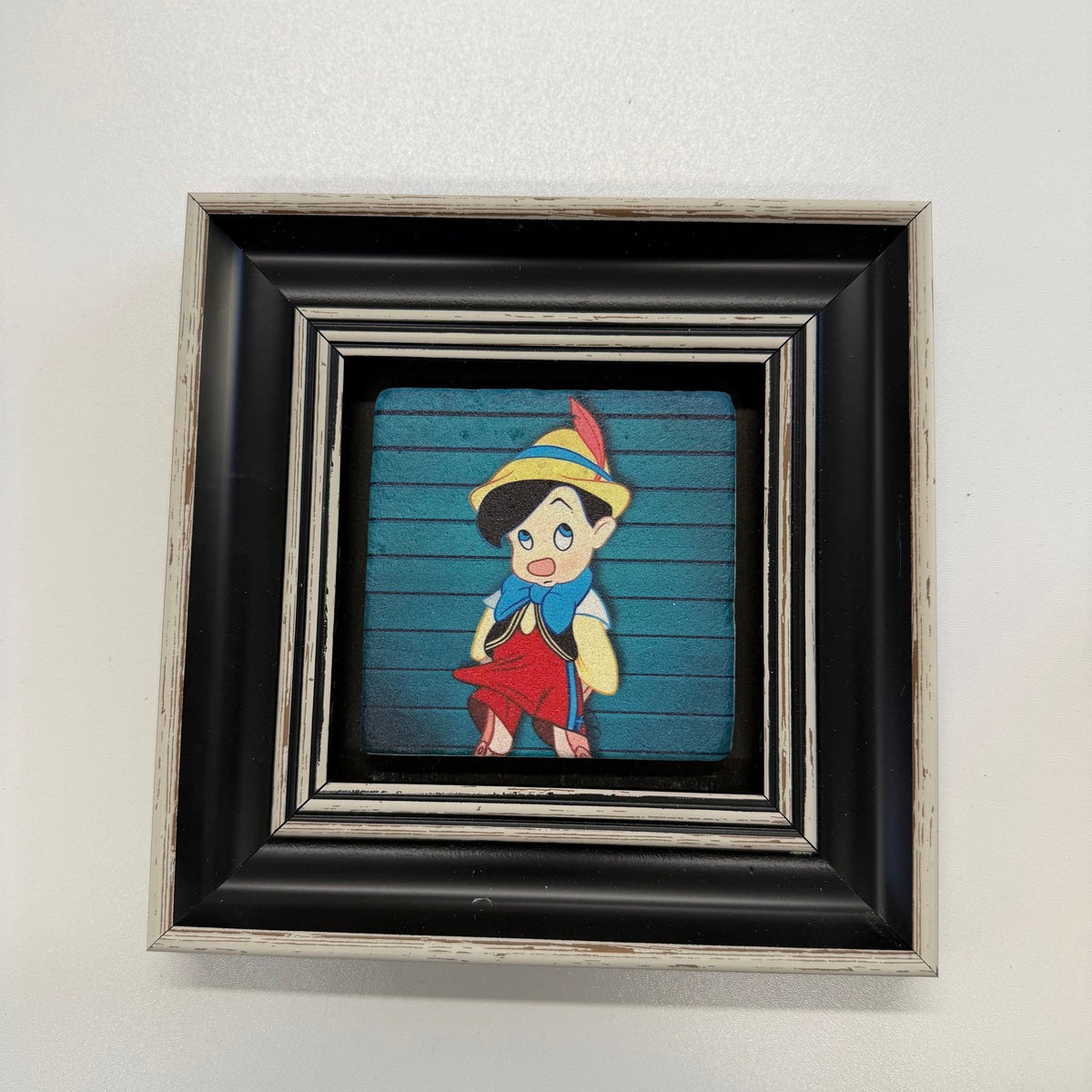 Variant Mapping v4 | pinocchio-natural-stone-coaster | with Black Frame | sha256:ad46460c54da