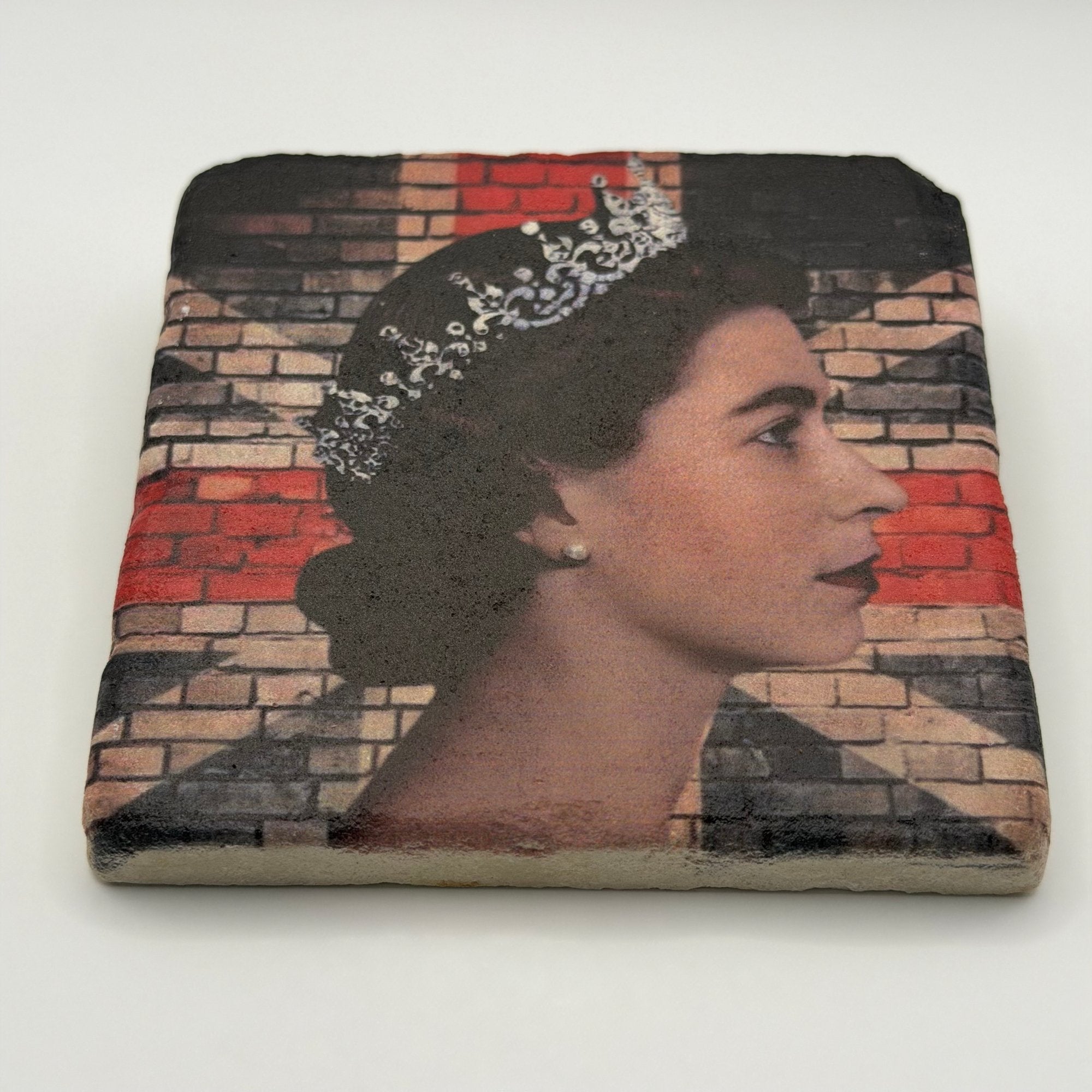 Queen Elizabeth brick wall artwork printed on square travertine stone coaster