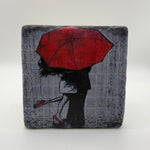 Red umbrella artwork printed on square natural travertine stone coaster