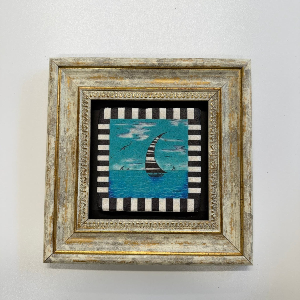 Variant Mapping v4 | sailboat-natural-travertine-stone-coaster | with Gold Frame | sha256:d7de25ef328d